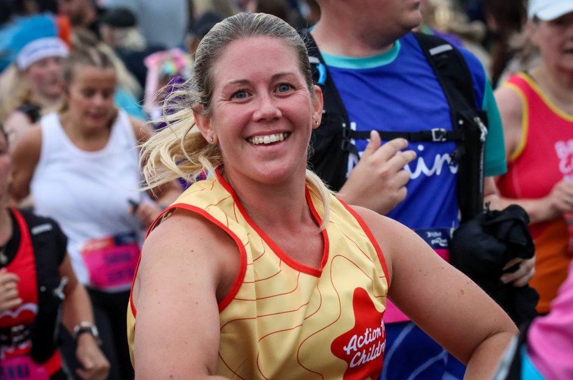 Bath Half Marathon Runner smiling at the camera