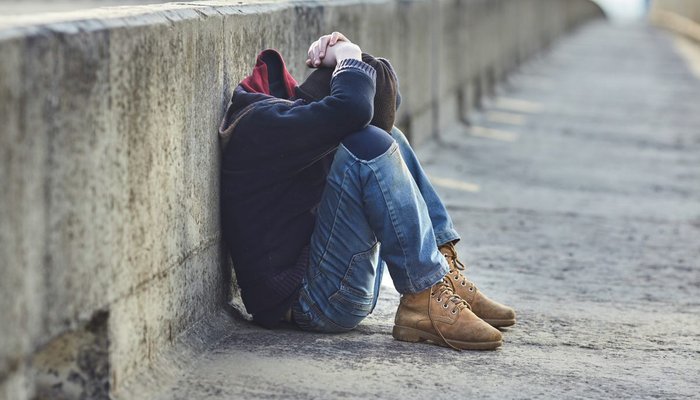 Young person on bridge