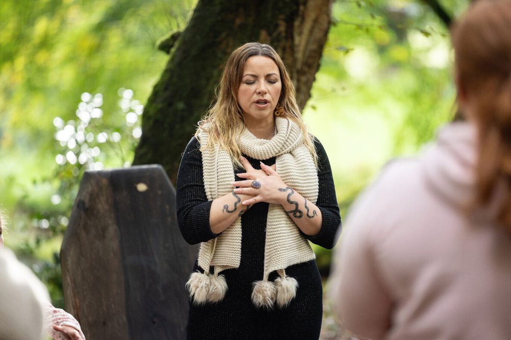 Charlotte Church doing vocal exercises with young carers aloud choir