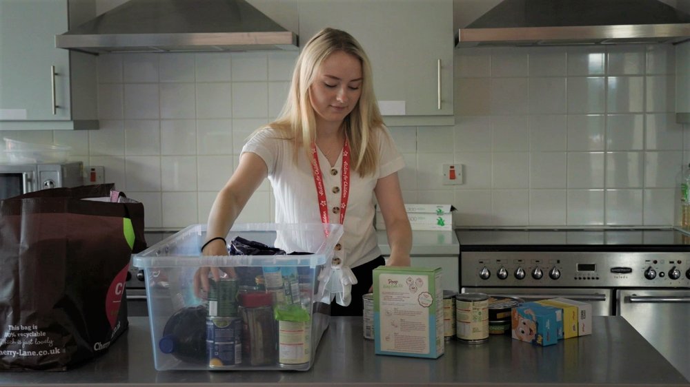 Courtney preparing an emergency food package