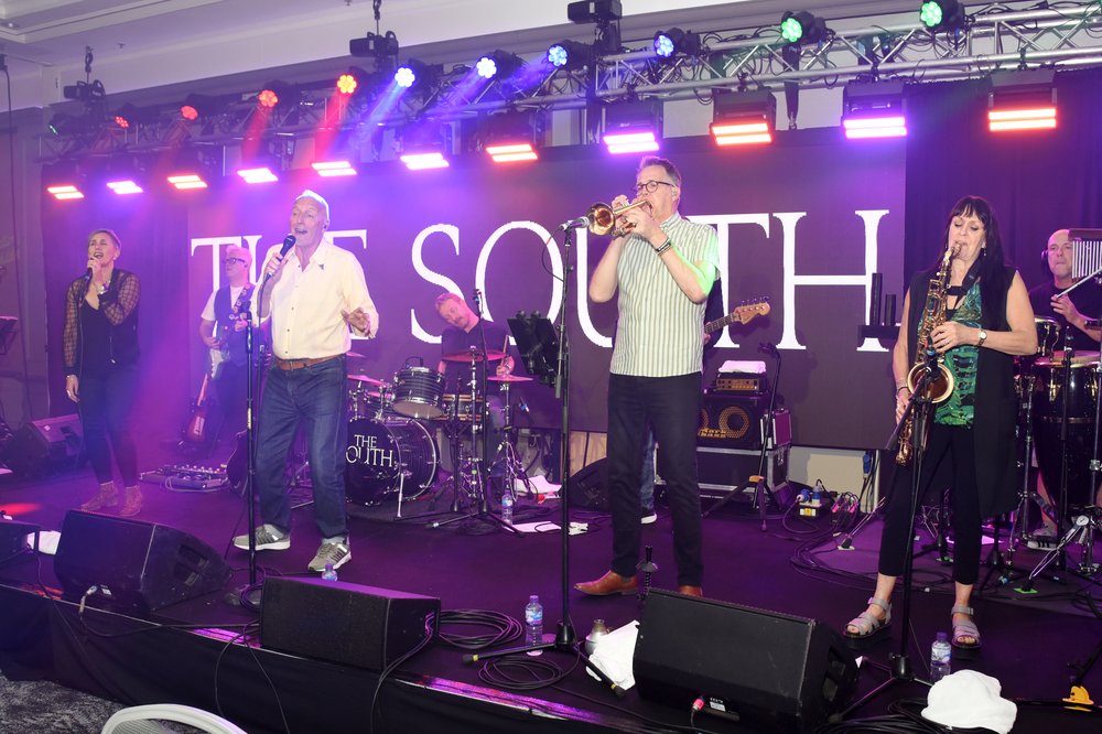 A band called The South performing on stage