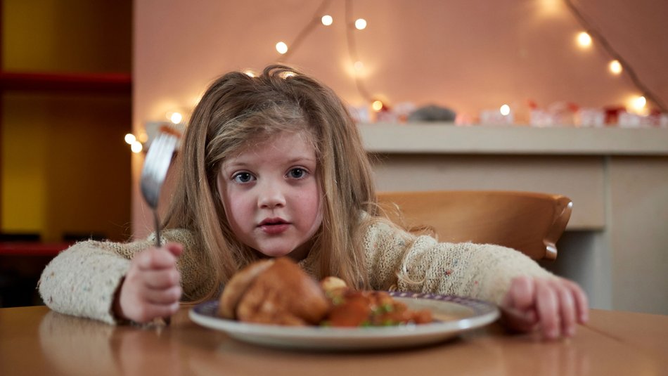 Girl eating dinner