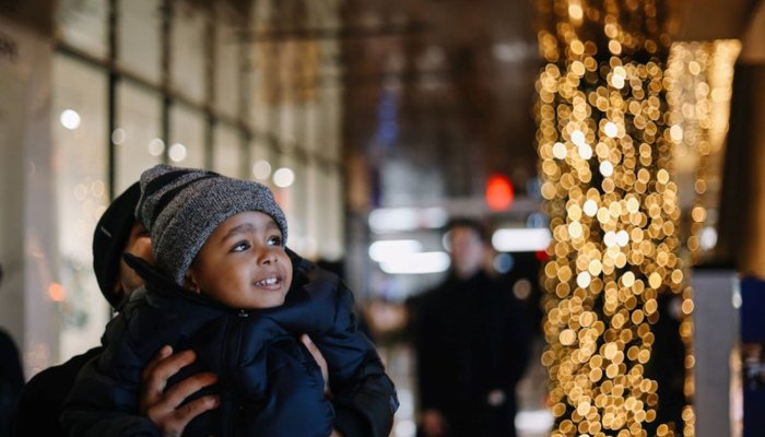 Little boy enjoying the Christmas lights