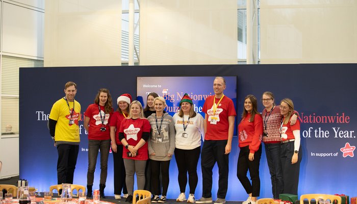 Nationwide colleagues and supporters on stage and supporting Secret Santa