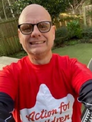 Niaill Whatmore in his Action for Children t-shirt