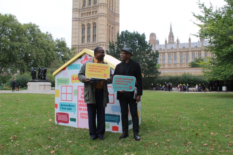Ronnie Archer Morgan (right) and Godfrey (left) standing outside the Houses of Parliment