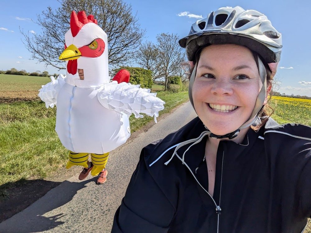 Sebastian Burley and wife training in his chicken costume for the London Marathon for Action for Children