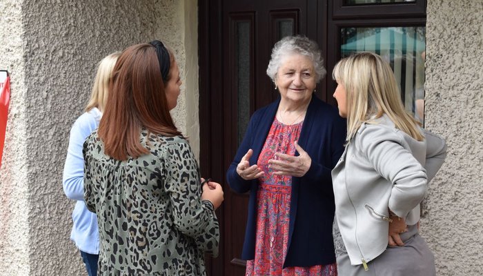 Sister Eluned Williams talking to a group of women