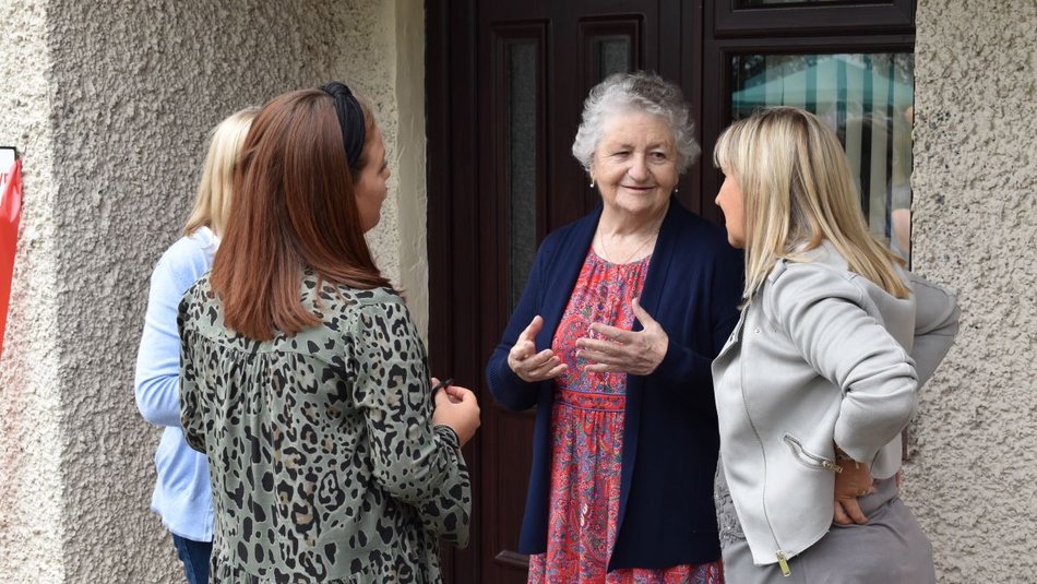 Sister Eluned Williams talking to a group of women