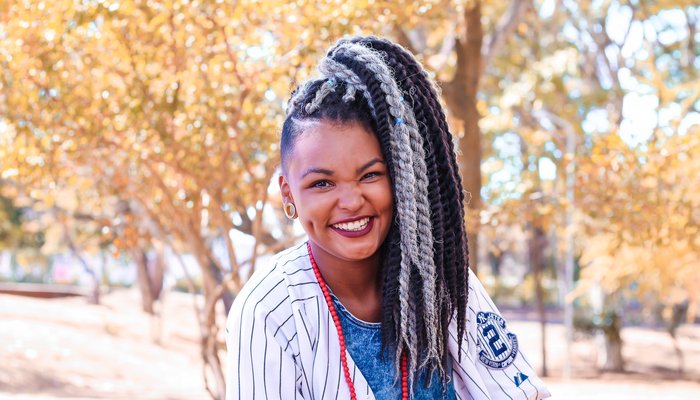 Very happy teenage girl outdoors