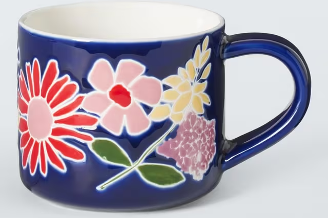 Floral printed stoneware mug in navy colour
