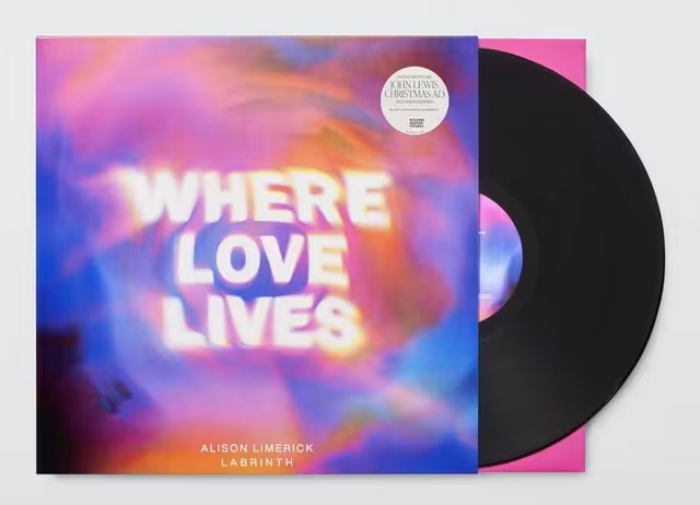 Vinyl record of song 'Where Love Lives' with multicoloured graphic cover