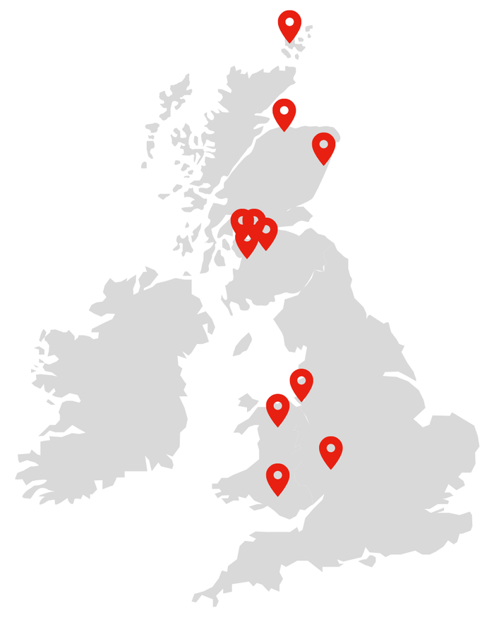 A map of the UK with red pins indicating Blues delivery locations