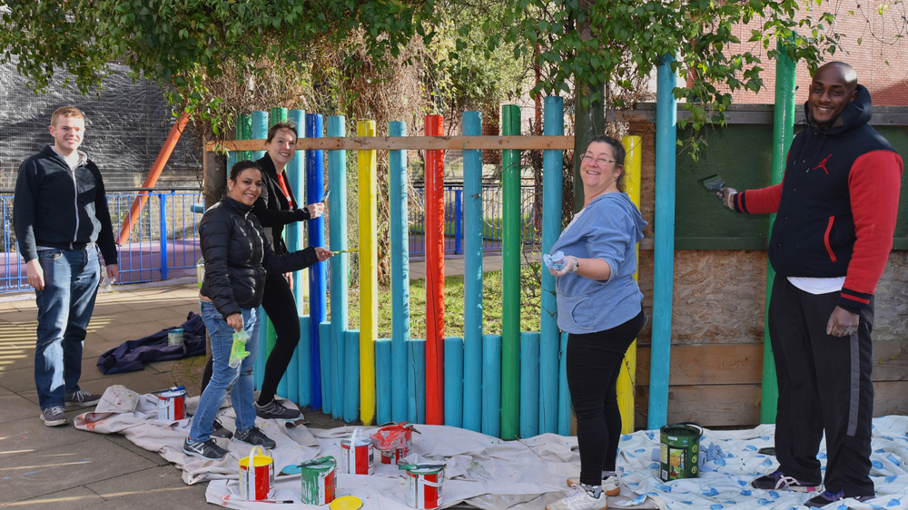 Royal mail staff painting at childrens service.png