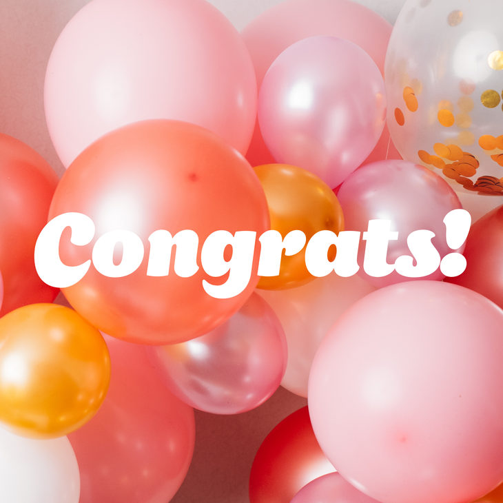 Congrats white text over balloon photograph