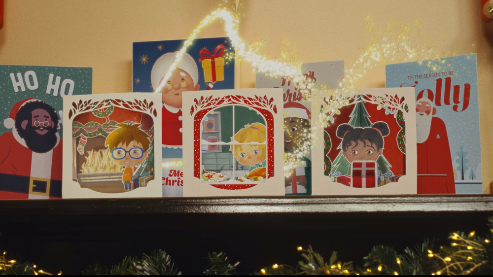 Secret Santa Christmas TV ad Festive mantlepiece with Christmas cards showing ilutrations of three happy children