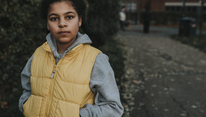 Young girl looking into camera